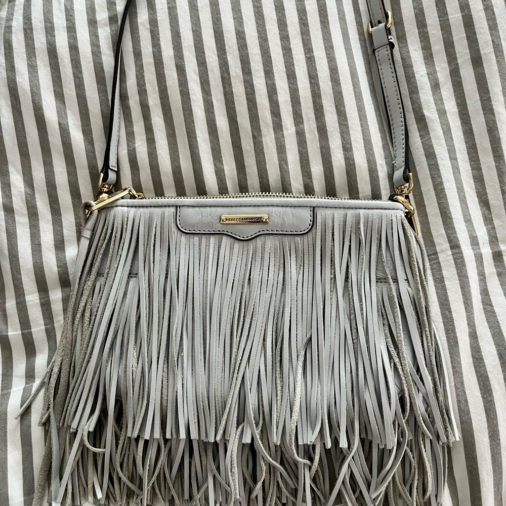 Rebecca Minkoff Finn cross body bag in light gray.